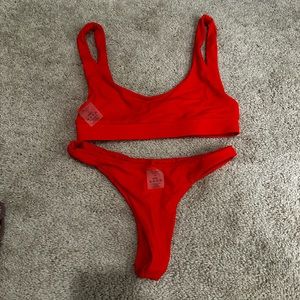 Anna Swimwear (orange or green suit)